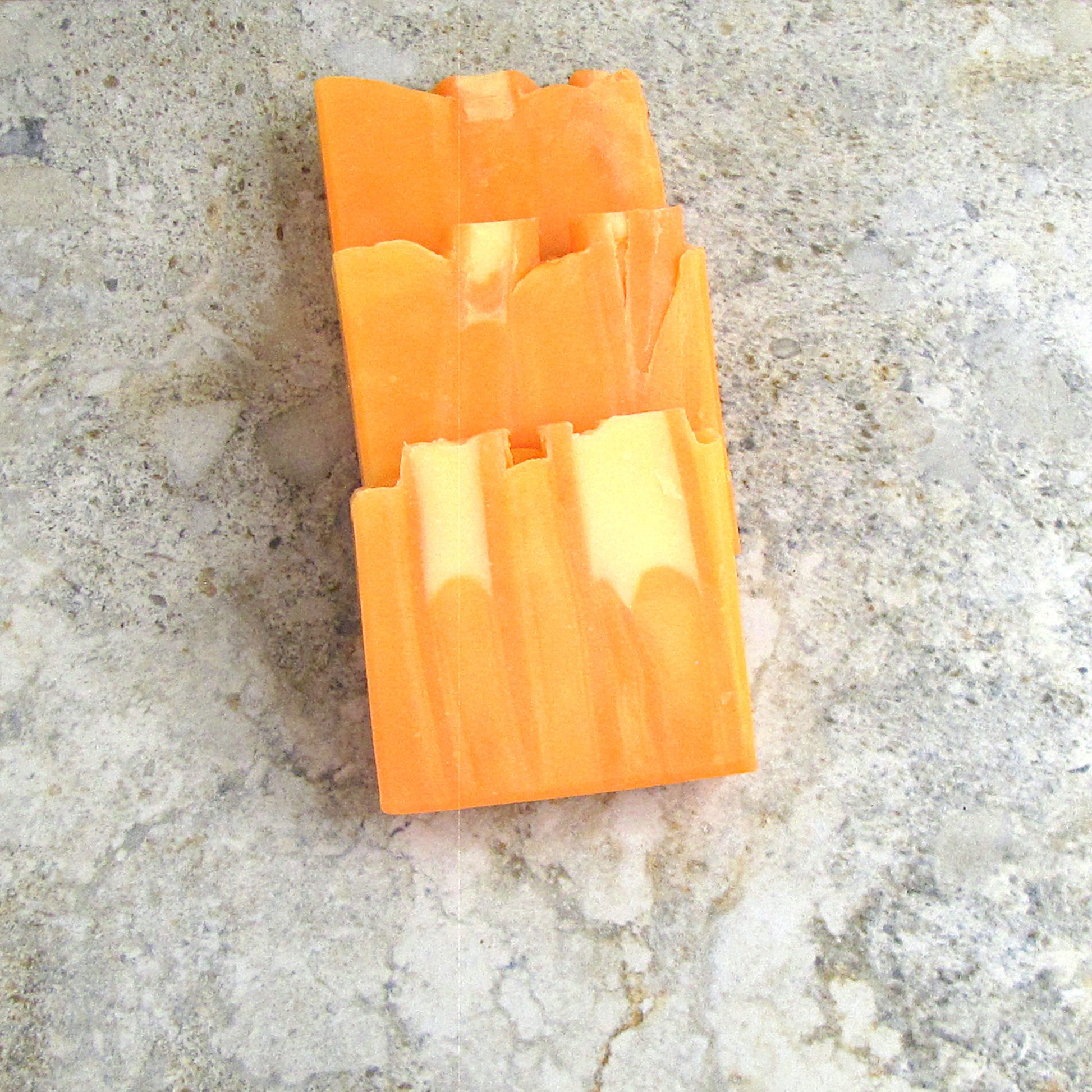 Citrus scented soap bars on the table