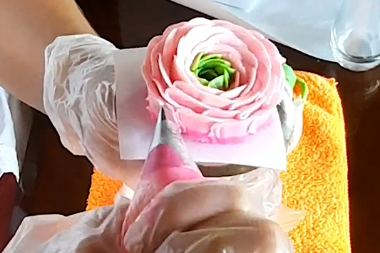 Piping roses with soap frosting