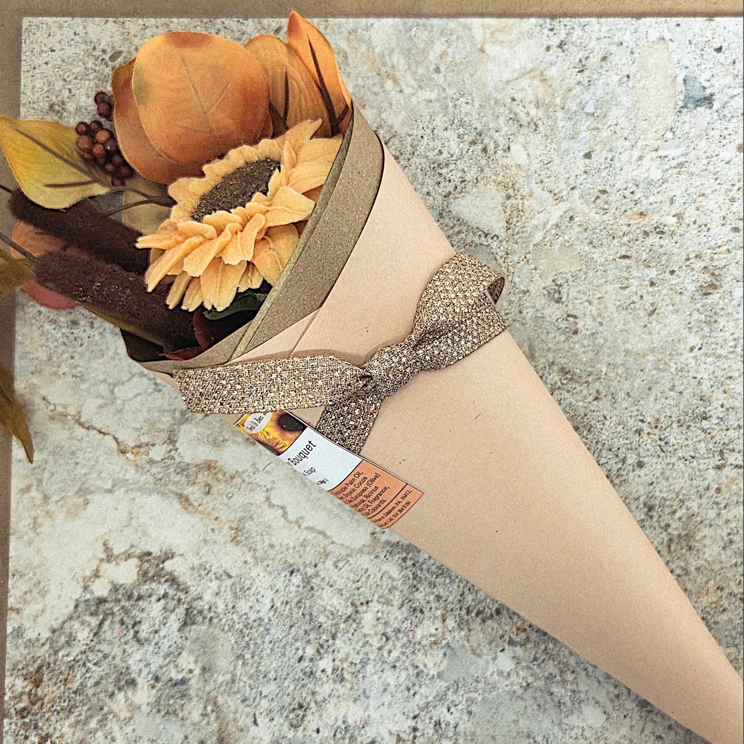 Decorative cone with autumn-themed elements on a textured surface