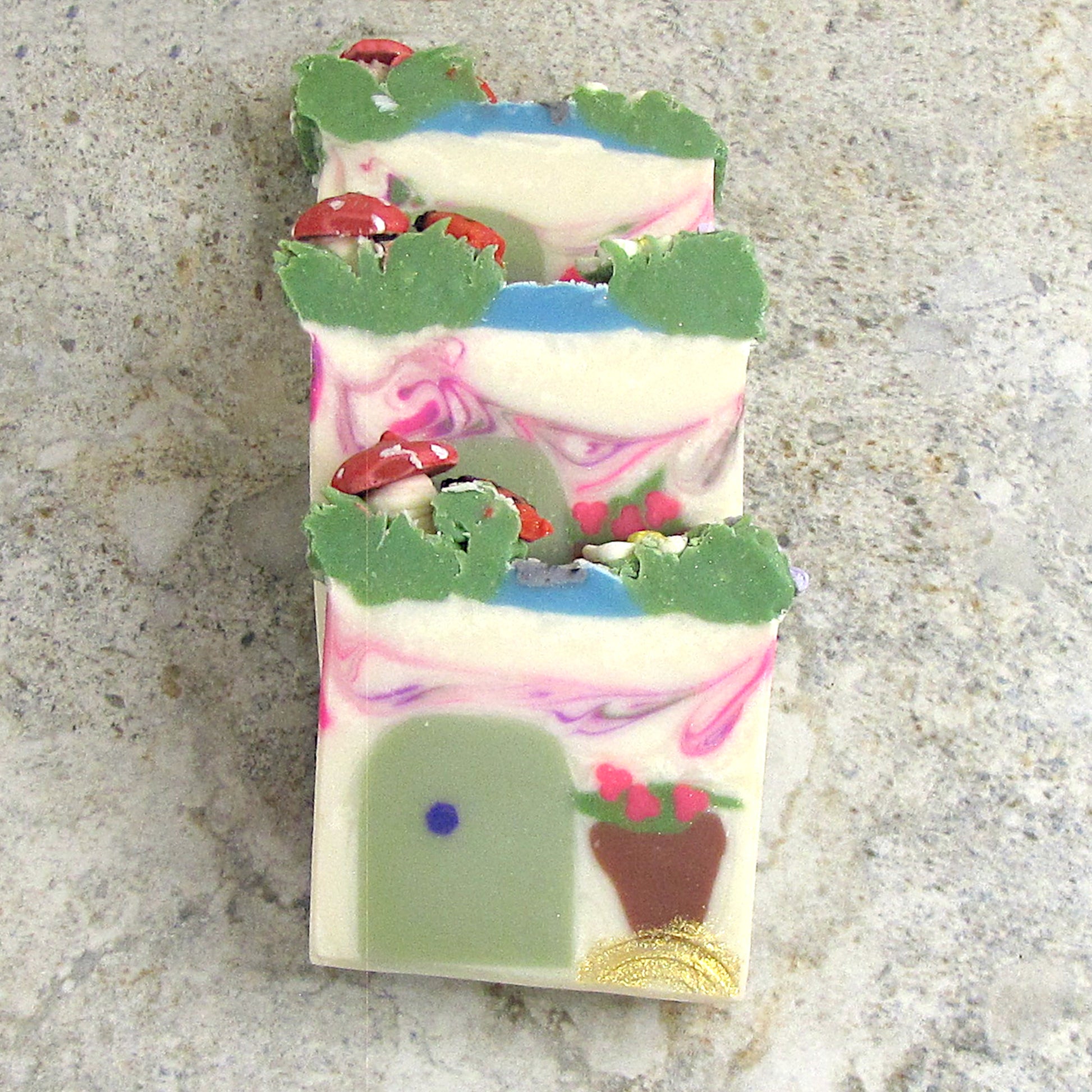 Fairy Garden Soap Bar with a door and pot of flowers in the design.