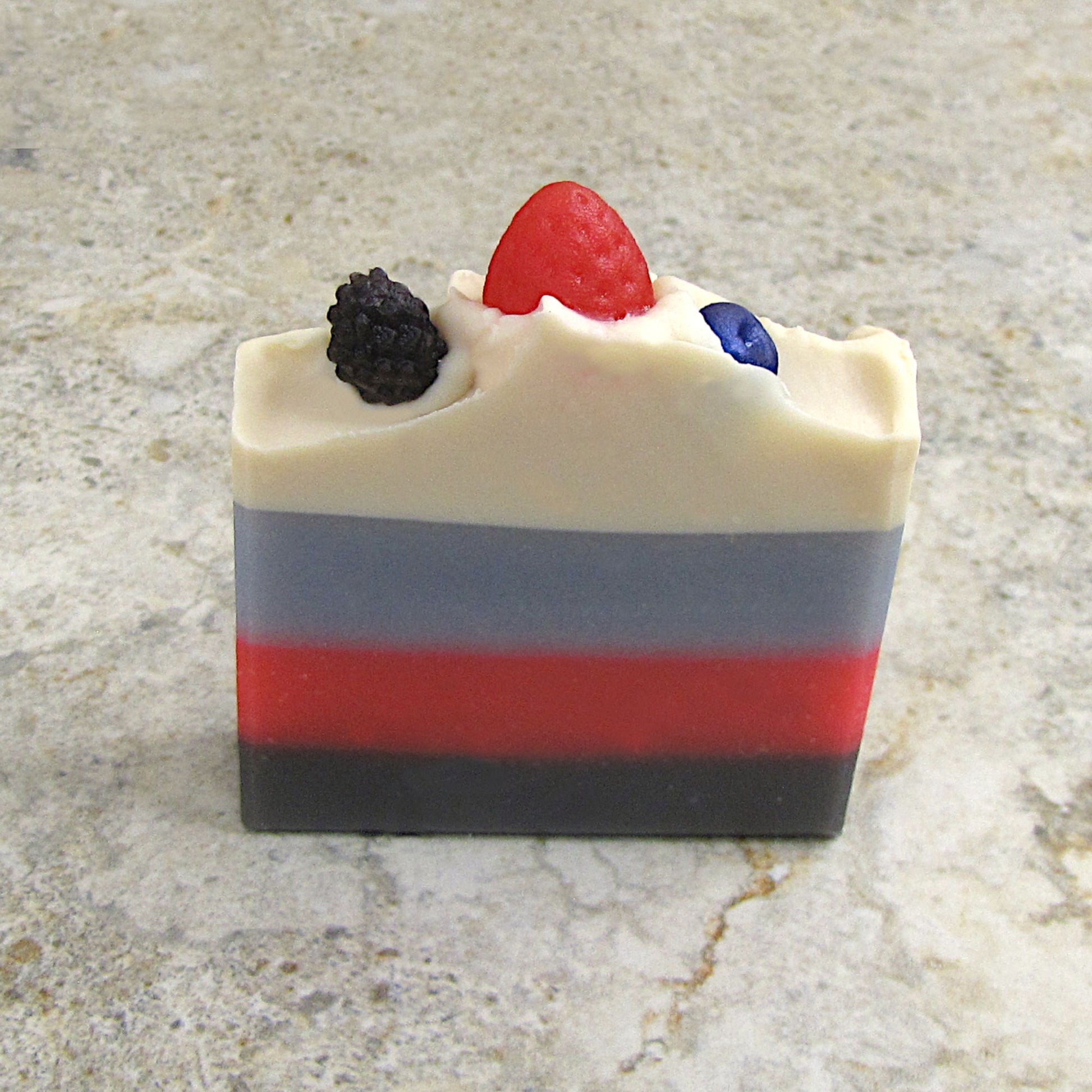 Berry picnic soap bar with soap berries on top 